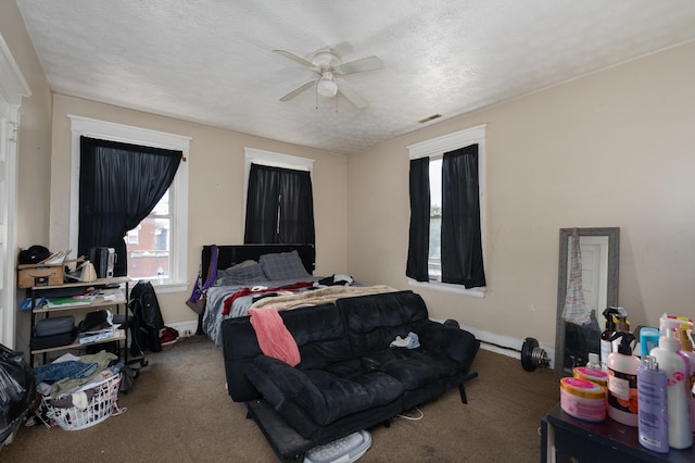 1706 Eastern Ave, Covington, KY 41014 - carpeted bedroom with a textured ceiling and a ceiling fan