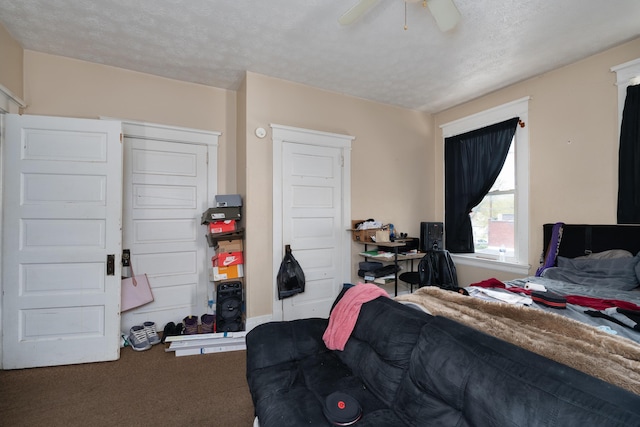1706 Eastern Ave, Covington, KY 41014 - carpeted bedroom with a textured ceiling and a ceiling fan