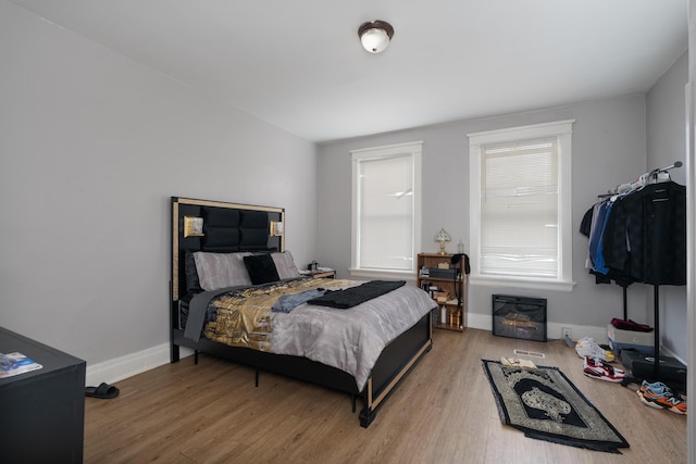 1706 Eastern Ave, Covington, KY 41014 - bedroom with wood finished floors and baseboards