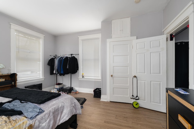 1706 Eastern Ave, Covington, KY 41014 - bedroom featuring light wood-style floors and baseboards