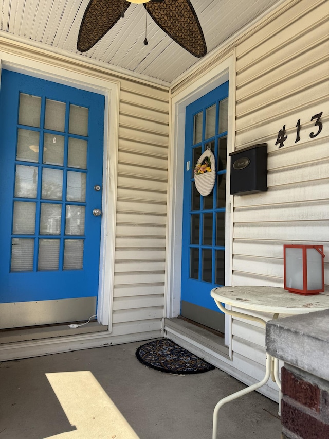 property entrance with covered porch