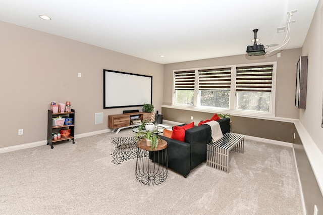 cinema room with recessed lighting, baseboards, and carpet floors
