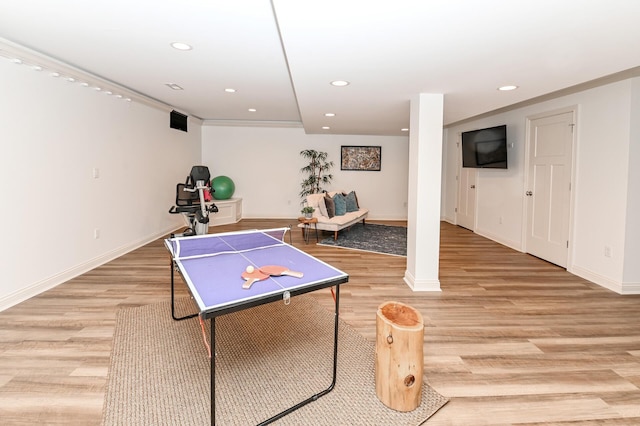 game room featuring light wood-style floors, baseboards, and recessed lighting