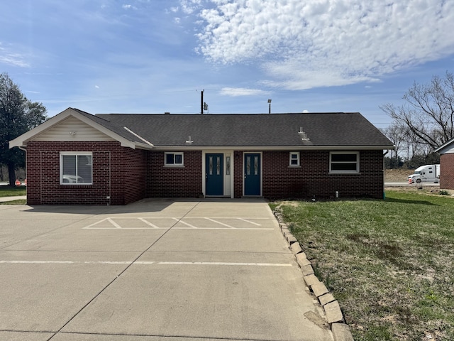 880 Donaldson Hwy, Erlanger, KY 41018 - view of front of house with roof with shingles, a front yard, and brick siding