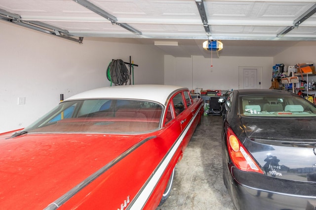 garage featuring a garage door opener