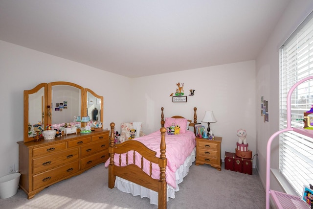 bedroom with light carpet