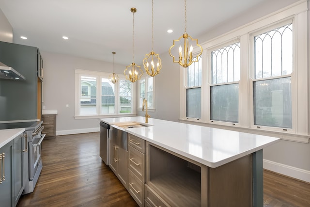 224 Wallace Ave, Covington, KY 41014 - kitchen with stainless steel appliances, baseboards, a chandelier, and gray cabinets