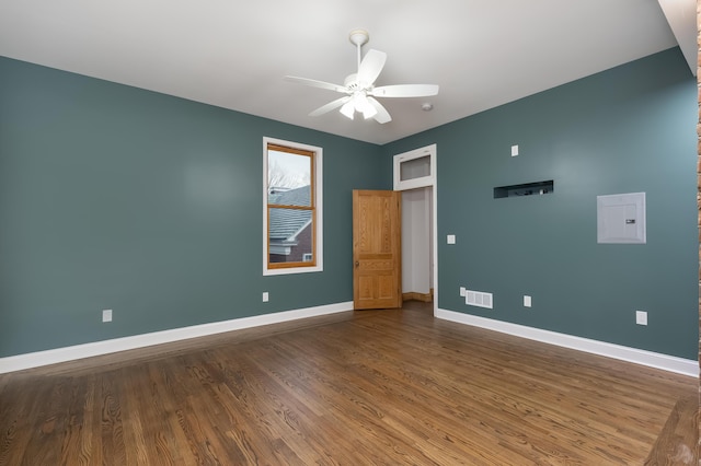 224 Wallace Ave, Covington, KY 41014 - unfurnished room featuring wood finished floors, visible vents, a ceiling fan, and baseboards
