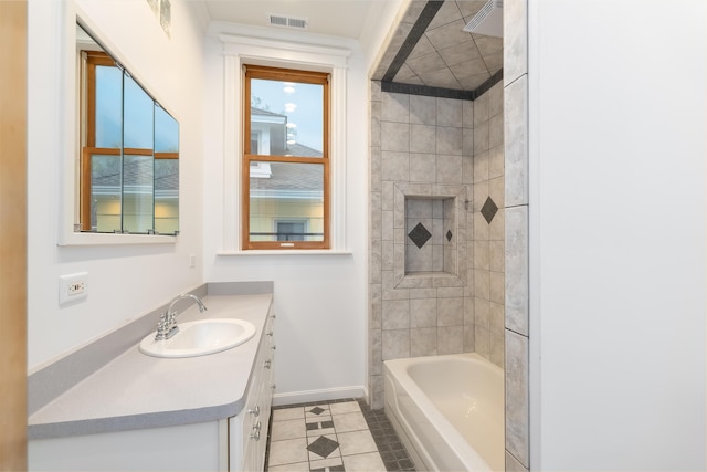 224 Wallace Ave, Covington, KY 41014 - bathroom with vanity, shower / tub combination, baseboards, tile patterned flooring, and visible vents