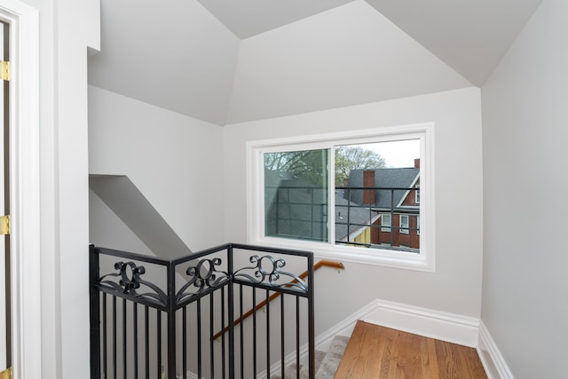 224 Wallace Ave, Covington, KY 41014 - stairway with lofted ceiling, baseboards, and wood finished floors