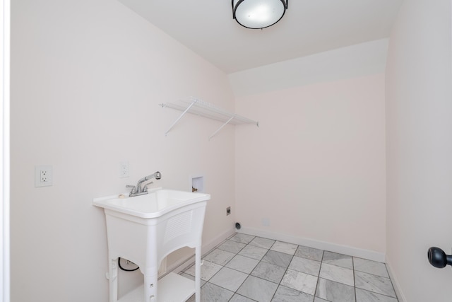 224 Wallace Ave, Covington, KY 41014 - washroom with baseboards, marble finish floor, laundry area, and washer hookup