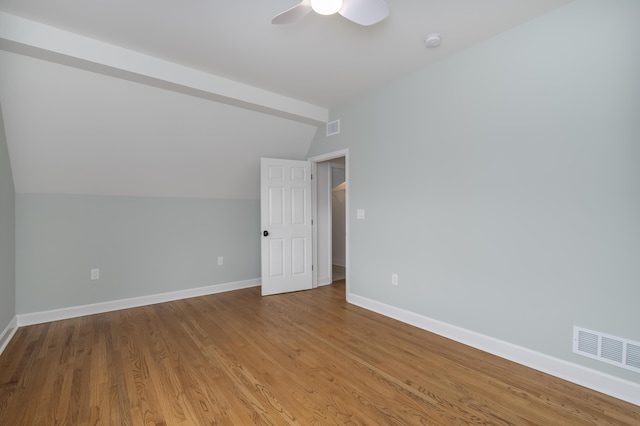224 Wallace Ave, Covington, KY 41014 - spare room featuring lofted ceiling, visible vents, baseboards, and wood finished floors