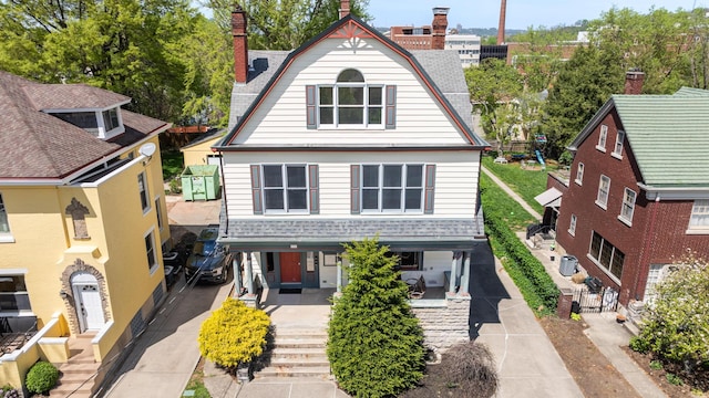 224 Wallace Ave, Covington, KY 41014 - view of front of home featuring a gambrel roof, a porch, a chimney, and a carport