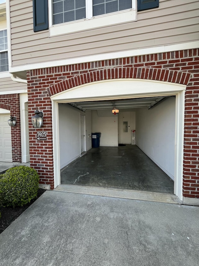 garage with driveway