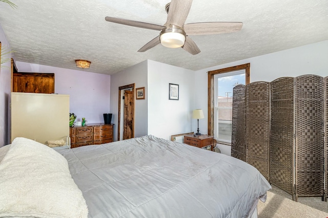 1028 Orchard St, Newport, KY 41071 - carpeted bedroom with a textured ceiling and a ceiling fan