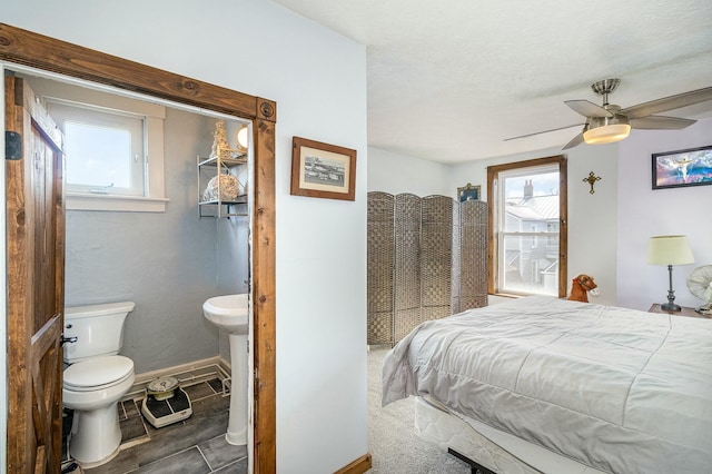 1028 Orchard St, Newport, KY 41071 - bedroom featuring baseboards, multiple windows, and a ceiling fan