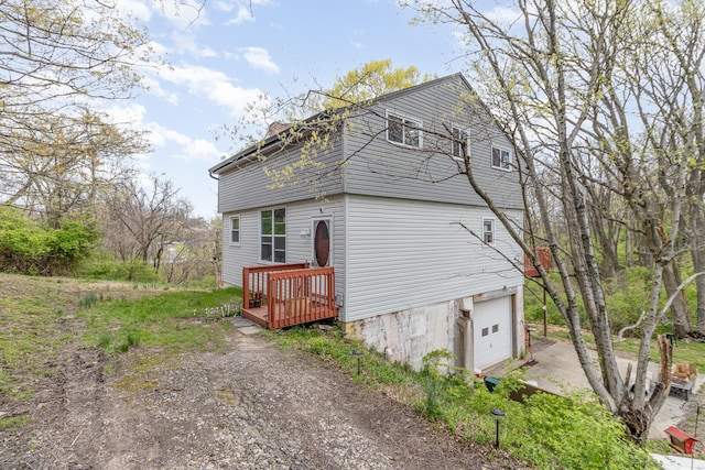 25 High St, Newport, KY 41071 - view of side of property with concrete driveway and a garage