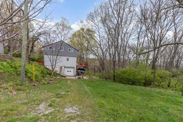25 High St, Newport, KY 41071 - view of yard featuring a garage and driveway