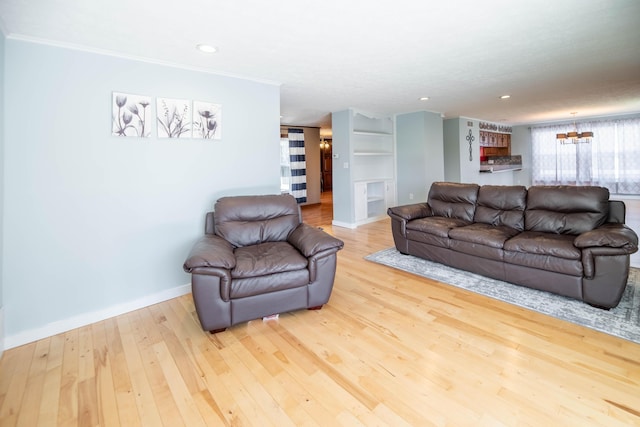 living area with baseboards, recessed lighting, and wood finished floors