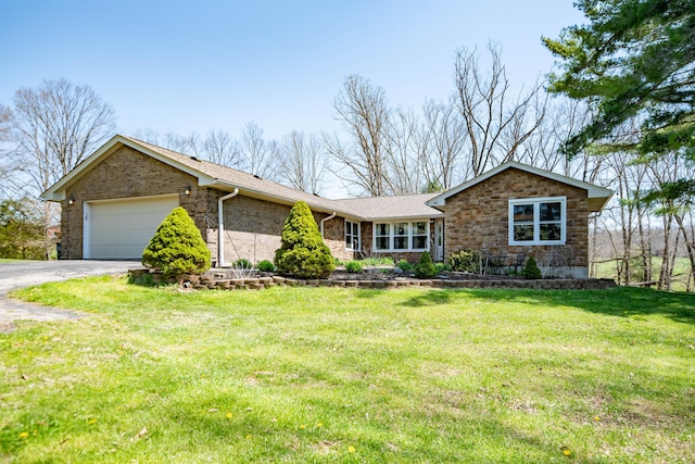 ranch-style home featuring an attached garage, a front lawn, aphalt driveway, and brick siding