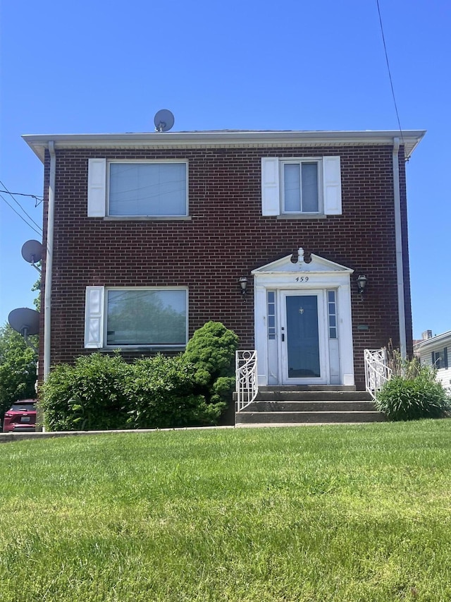 459 Commonwealth Ave, Erlanger, KY 41018 - view of front of property featuring a front yard and brick siding