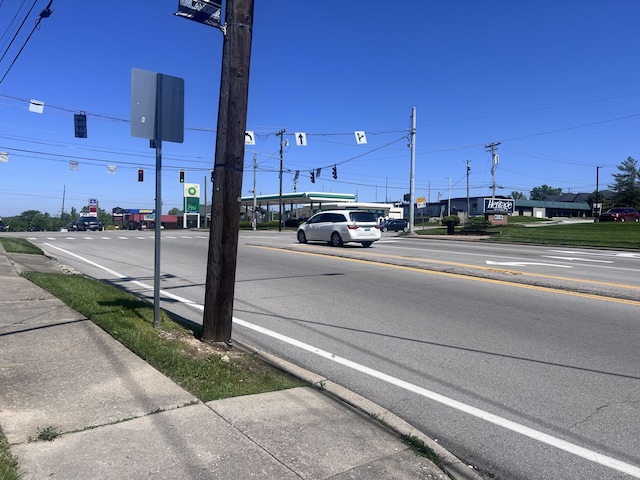 459 Commonwealth Ave, Erlanger, KY 41018 - view of asphalt street with traffic lights, sidewalks, and curbs