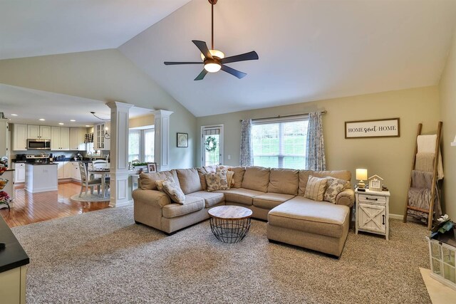 11506 Sutherland Dr, Walton, KY 41094 - living room featuring light wood-style flooring, decorative columns, recessed lighting, a ceiling fan, and high vaulted ceiling