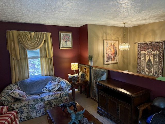 living area with a textured ceiling