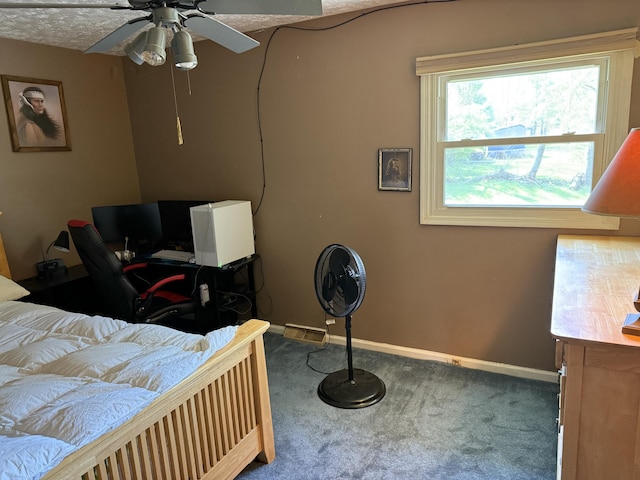 carpeted bedroom with baseboards