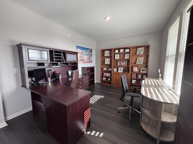 home office featuring baseboards and dark wood-style flooring