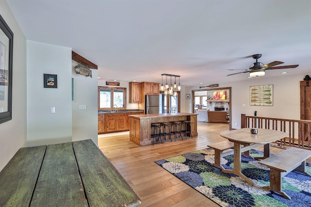 445 Elk Lake Resort Rd Unit 947-948, Owenton, KY 40359 - living area with healthy amount of natural light, light wood-style floors, ceiling fan, recessed lighting, and a chandelier