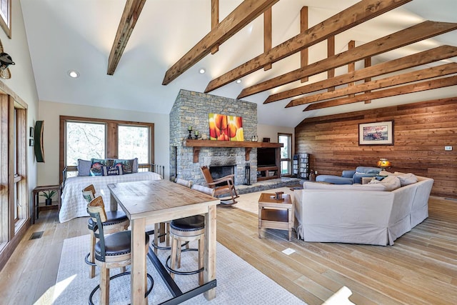 445 Elk Lake Resort Rd Unit 947-948, Owenton, KY 40359 - living room with wooden walls, a fireplace, light wood finished floors, and recessed lighting