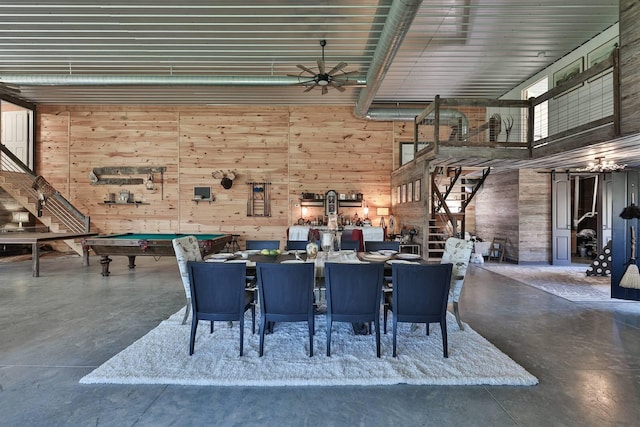view of patio with stairway, ceiling fan, and outdoor dining space