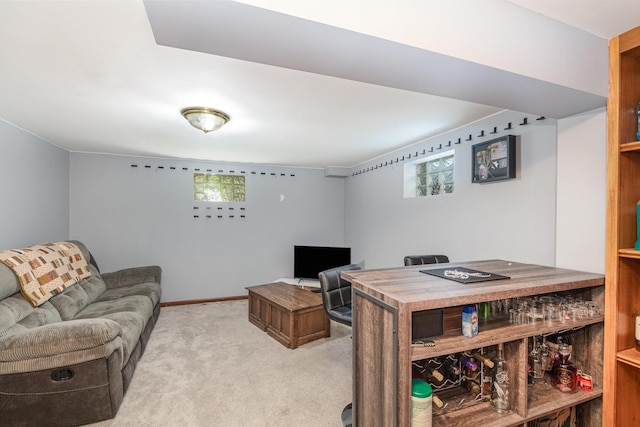 living area featuring light carpet