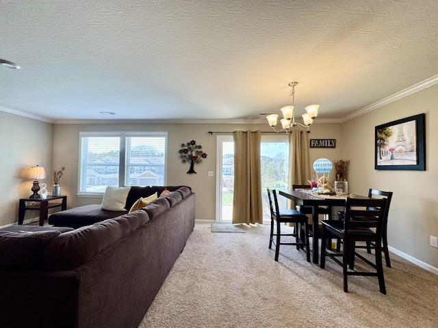 dining room featuring light colored carpet, an inviting chandelier, ornamental molding, and a textured ceiling