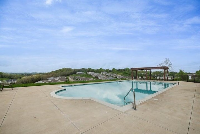 pool with a patio