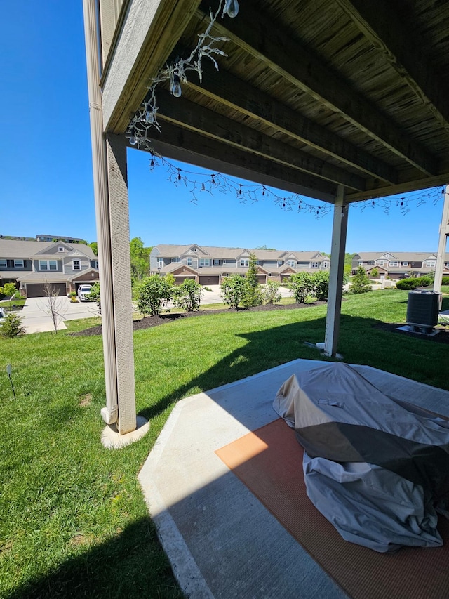 7618 Woodhaven Ct, Alexandria, KY 41001 - view of patio with a residential view and central AC