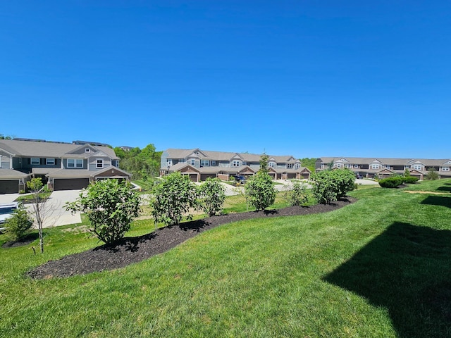 7618 Woodhaven Ct, Alexandria, KY 41001 - view of grassy yard featuring a residential view and an attached garage