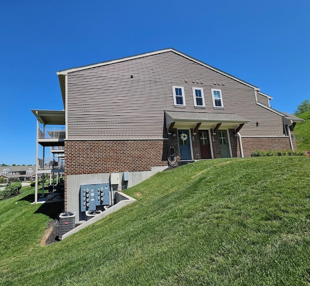 7618 Woodhaven Ct, Alexandria, KY 41001 - back of house with a yard, central AC unit, and brick siding