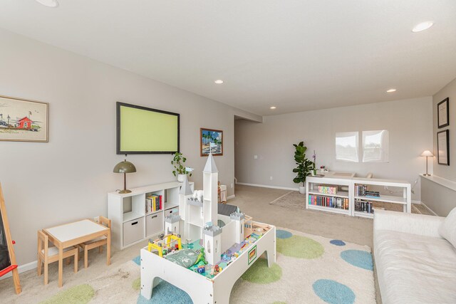 playroom featuring carpet, recessed lighting, and baseboards