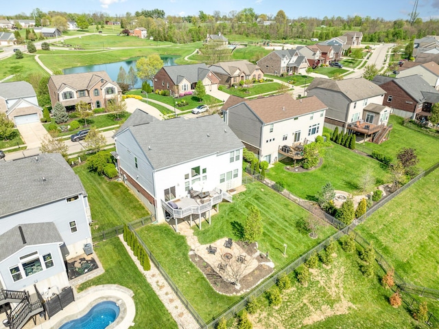 aerial view with a residential view and a water view