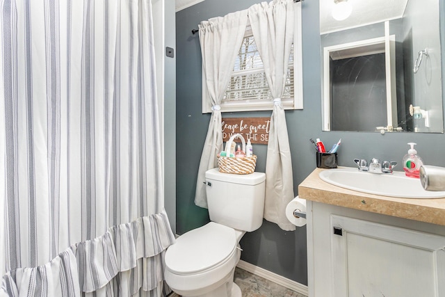bathroom with a shower with shower curtain, baseboards, toilet, and vanity