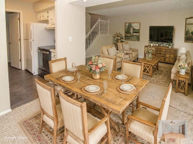 dining room with stairs