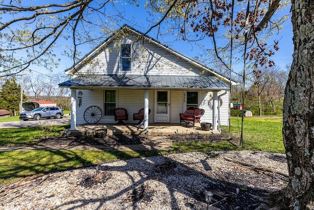 5375 Sherman Mount Zion, Dry Ridge, KY 41035 - view of front of property featuring a porch, metal roof, a front yard, and a standing seam roof