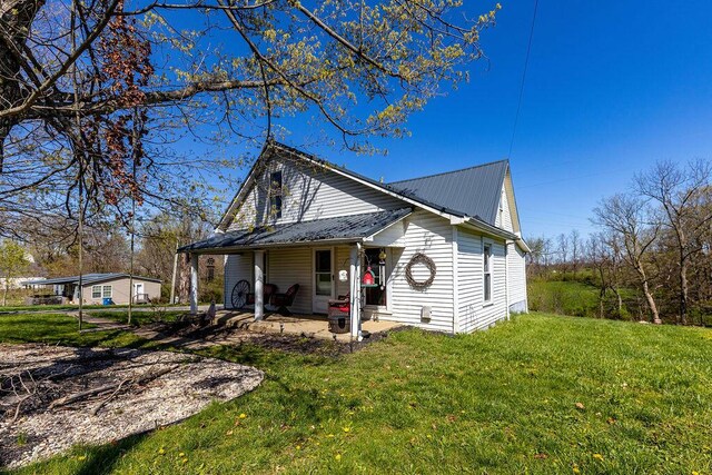 5375 Sherman Mount Zion, Dry Ridge, KY 41035 - view of front of house featuring metal roof and a front lawn