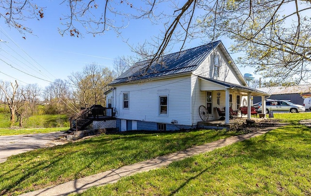 5375 Sherman Mount Zion, Dry Ridge, KY 41035 - view of side of property featuring a porch, a yard, and metal roof