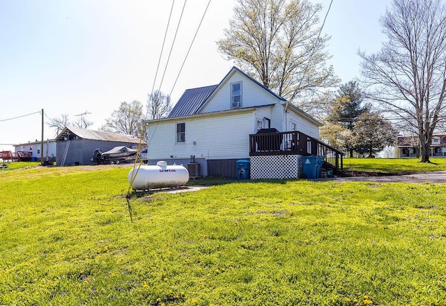 5375 Sherman Mount Zion, Dry Ridge, KY 41035 - back of house featuring central AC unit and a lawn