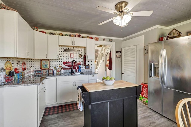 5375 Sherman Mount Zion, Dry Ridge, KY 41035 - kitchen with stainless steel fridge with ice dispenser, a sink, light wood finished floors, ceiling fan, and crown molding