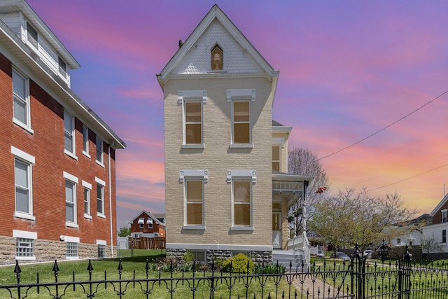 118 Electric Ave, Southgate, KY 41071 - view of front facade featuring a front yard, covered porch, and fence private yard