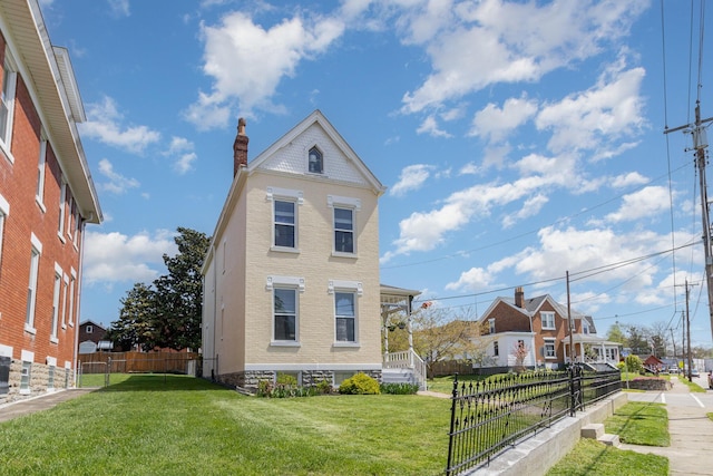118 Electric Ave, Southgate, KY 41071 - view of home's exterior featuring fence, a chimney, a yard, and a residential view